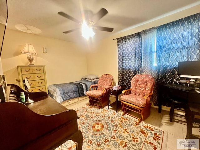 3104 Buckingham Ct, Brownsville, TX 78526 - tiled bedroom featuring a ceiling fan