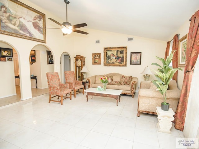 3104 Buckingham Ct, Brownsville, TX 78526 - living room with a ceiling fan, vaulted ceiling, arched walkways, and light tile patterned flooring