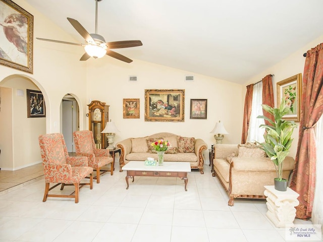 3104 Buckingham Ct, Brownsville, TX 78526 - living area with vaulted ceiling, ceiling fan, arched walkways, and light tile patterned floors