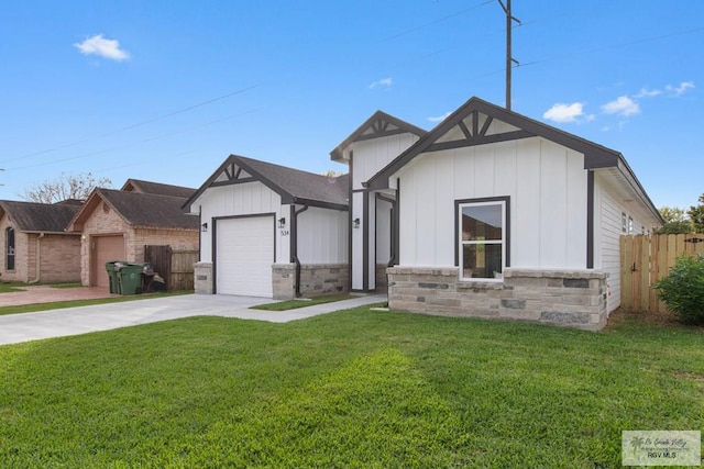 view of front of home featuring a garage and a front lawn