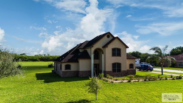 exterior space with a lawn