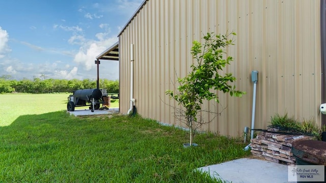 view of home's exterior featuring a yard