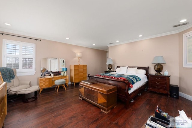 bedroom featuring crown molding and dark hardwood / wood-style flooring