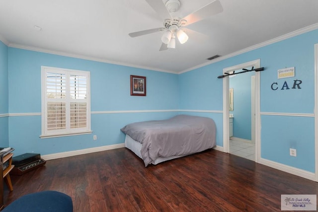 bedroom featuring crown molding, hardwood / wood-style floors, and ceiling fan