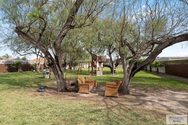 view of yard with a playground