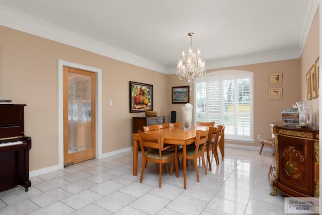 dining area featuring crown molding, light tile patterned floors, and a notable chandelier