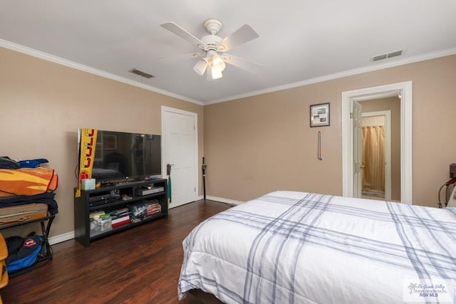 bedroom featuring ceiling fan, ornamental molding, and dark hardwood / wood-style floors