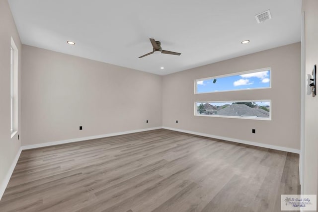 3330 Calle Bolivia, Brownsville, TX 78521 - empty room featuring a ceiling fan, wood finished floors, baseboards, and recessed lighting