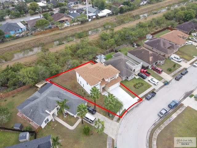 3330 Calle Bolivia, Brownsville, TX 78521 - aerial view of residential area with property boundaries highlighted