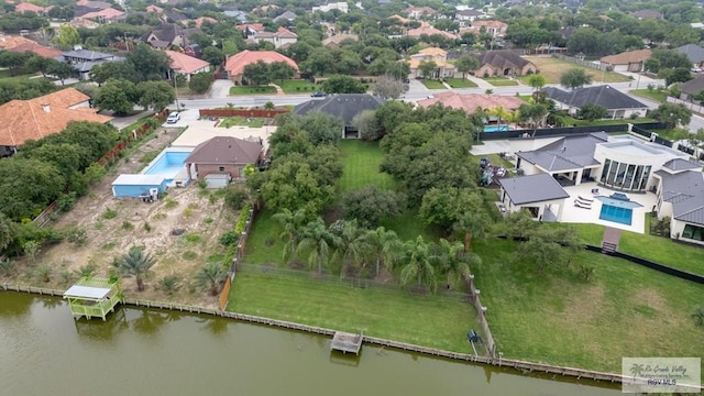 5363 Rustic Manor Dr, Brownsville, TX 78526 - aerial view of residential area with a pool and a large body of water