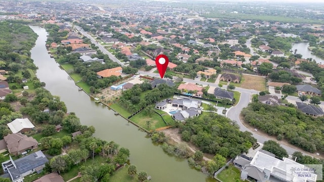 5363 Rustic Manor Dr, Brownsville, TX 78526 - aerial view of property and surrounding area featuring a large body of water and nearby suburban area