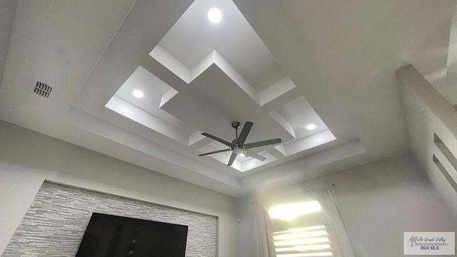 interior details featuring coffered ceiling, recessed lighting, visible vents, and ceiling fan