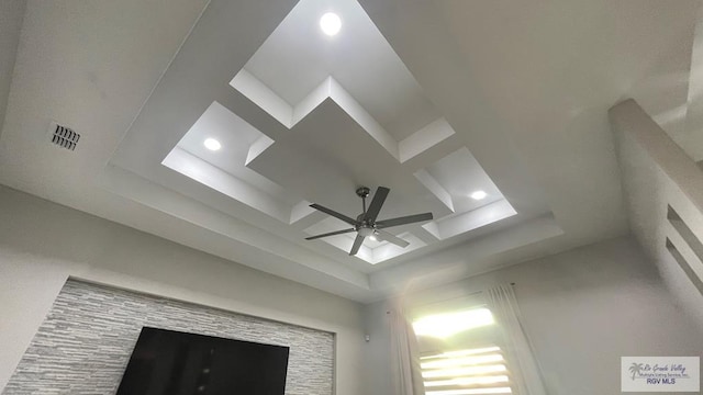 room details featuring coffered ceiling, recessed lighting, visible vents, and ceiling fan