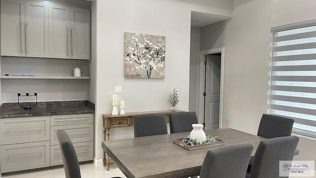 dining room with light tile patterned floors