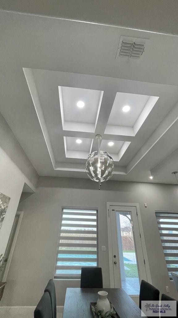 dining room featuring visible vents, coffered ceiling, beam ceiling, and recessed lighting