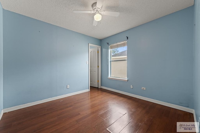 1013 Champlain Dr, Brownsville, TX 78526 - spare room featuring a textured ceiling, wood finished floors, and a ceiling fan
