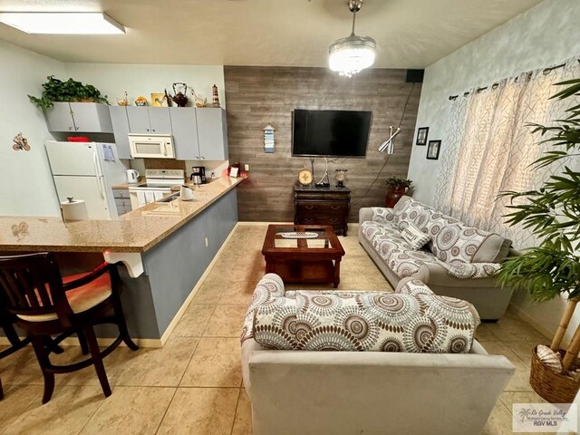 living room featuring light tile patterned floors