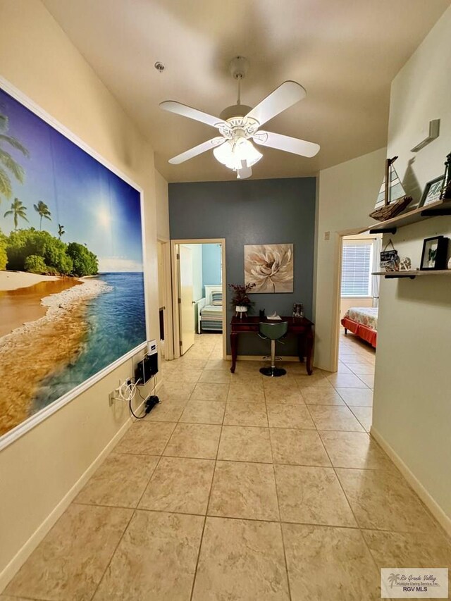 hallway featuring light tile patterned floors