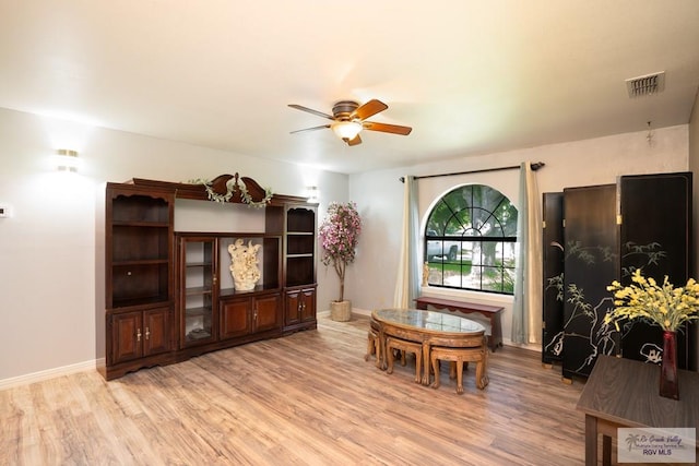 interior space featuring light hardwood / wood-style flooring and ceiling fan