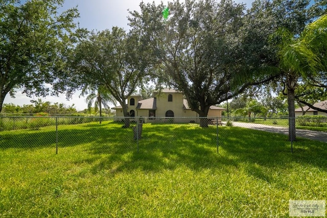 view of yard with a rural view