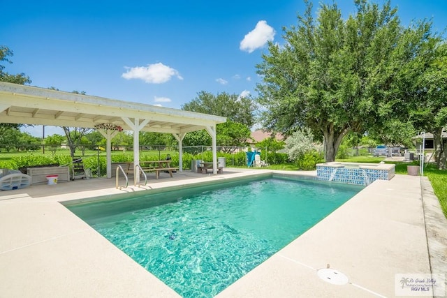 view of pool featuring a patio