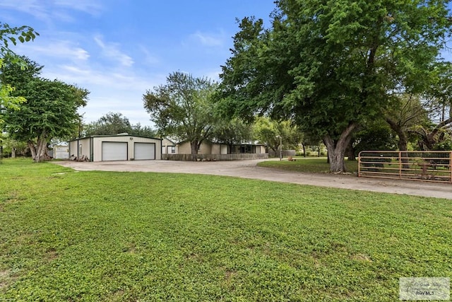 view of yard with a garage