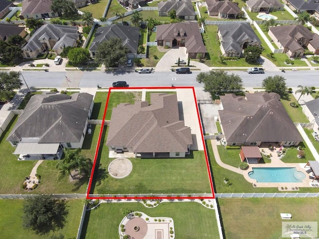 5706 Spicewood, Harlingen, TX 78552 - aerial perspective of suburban area with a pool area and property boundaries highlighted