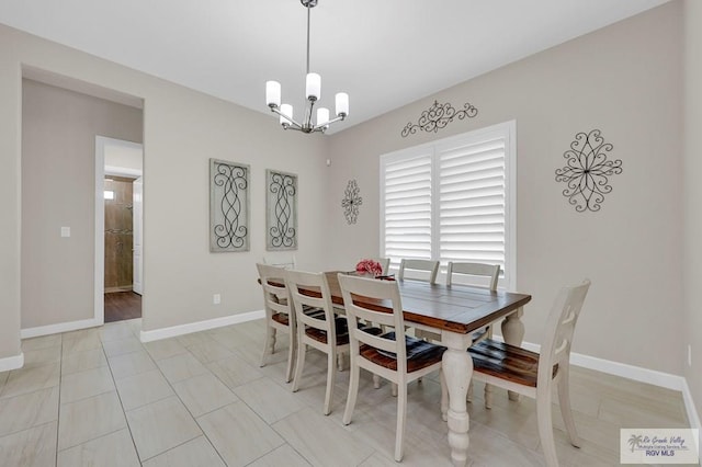 5706 Spicewood, Harlingen, TX 78552 - dining area featuring a chandelier and baseboards