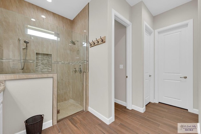 5706 Spicewood, Harlingen, TX 78552 - full bath with tiled shower, wood finished floors, and recessed lighting