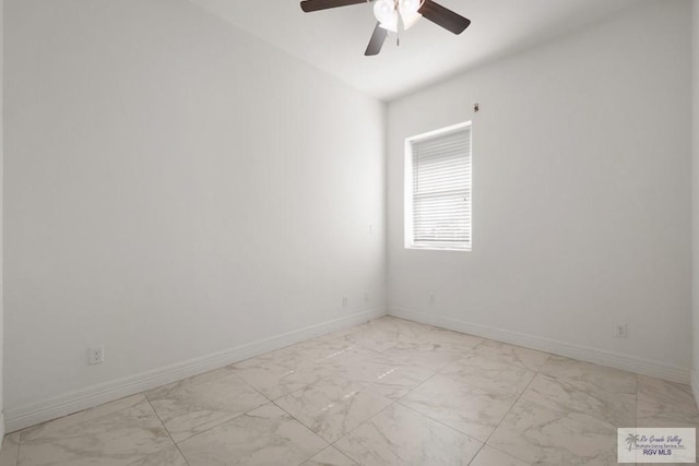 110 E Retama St, South Padre Island, TX 78597 - spare room featuring light marble finish floors and ceiling fan