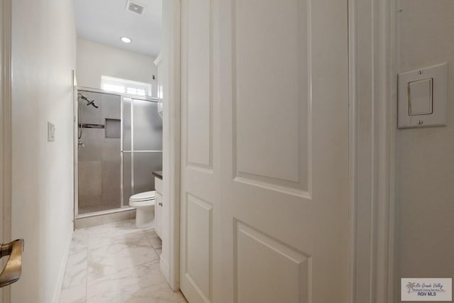 110 E Retama St, South Padre Island, TX 78597 - bathroom featuring marble finish floors and a stall shower