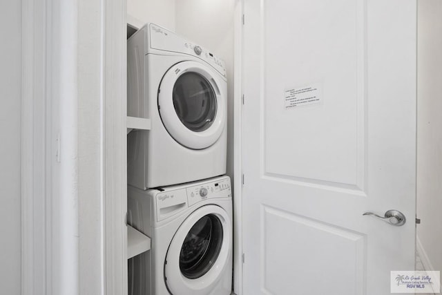 110 E Retama St, South Padre Island, TX 78597 - laundry room featuring stacked washer / dryer