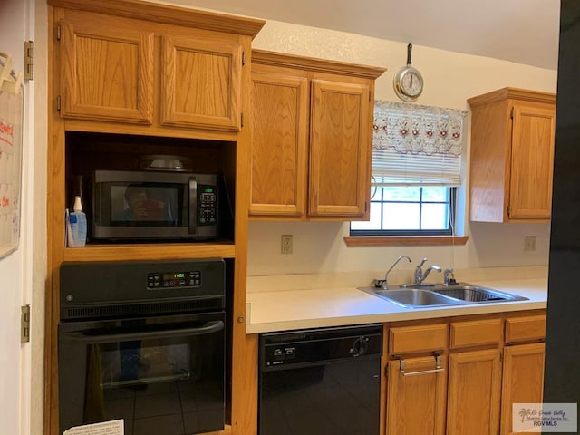 35 Yucatan Ct, Brownsville, TX 78526 - kitchen featuring black appliances, a sink, and light countertops