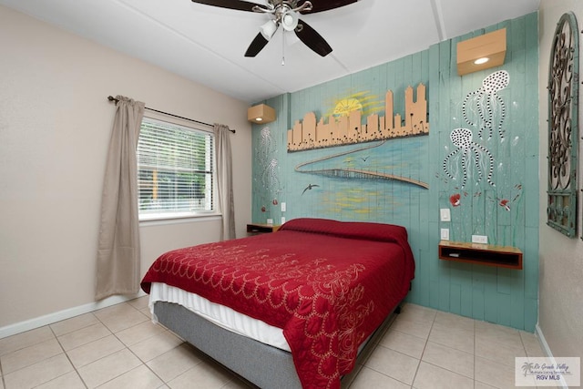 tiled bedroom featuring ceiling fan