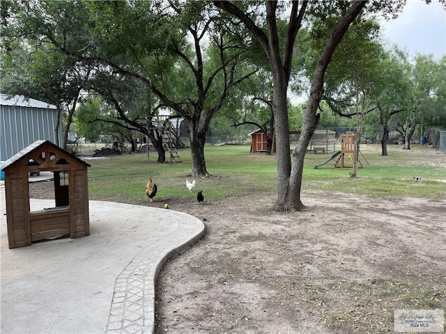 view of yard with a playground