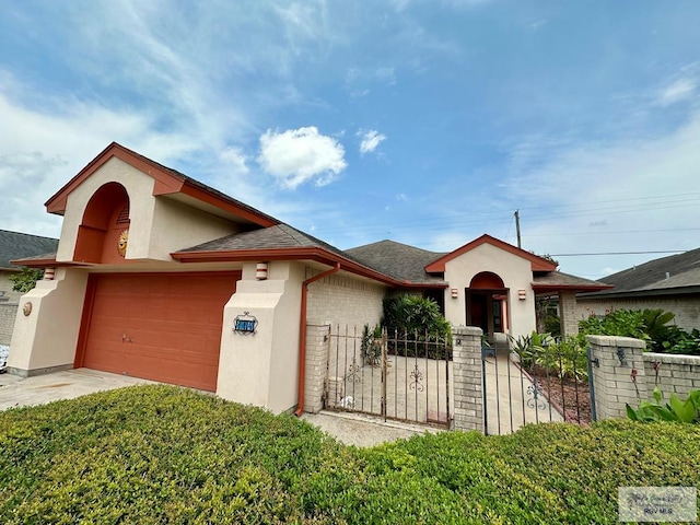 114 Willow Cir, Harlingen, TX 78552 - single story home featuring a garage, stucco siding, and a shingled roof
