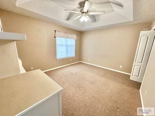 114 Willow Cir, Harlingen, TX 78552 - unfurnished room featuring ceiling fan, a textured ceiling, carpet flooring, and baseboards