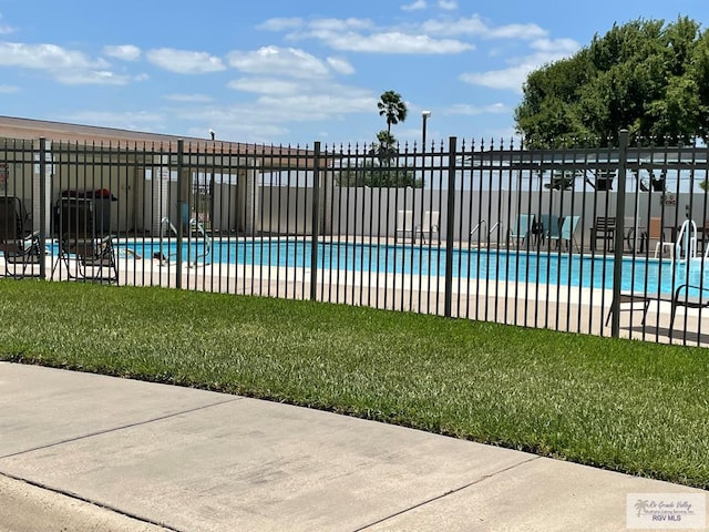 114 Willow Cir, Harlingen, TX 78552 - community pool featuring a patio area