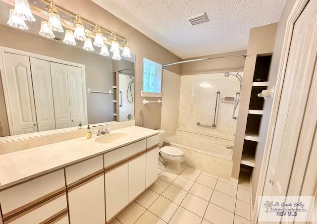 114 Willow Cir, Harlingen, TX 78552 - bathroom with bathtub / shower combination, toilet, a textured ceiling, vanity, and tile patterned flooring