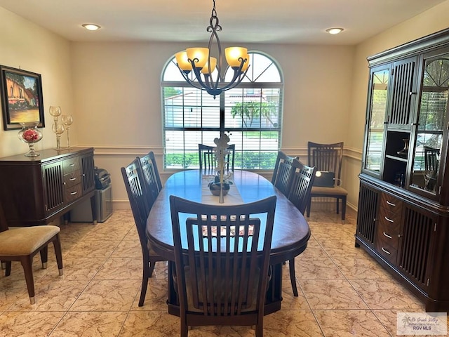 dining room featuring recessed lighting and an inviting chandelier