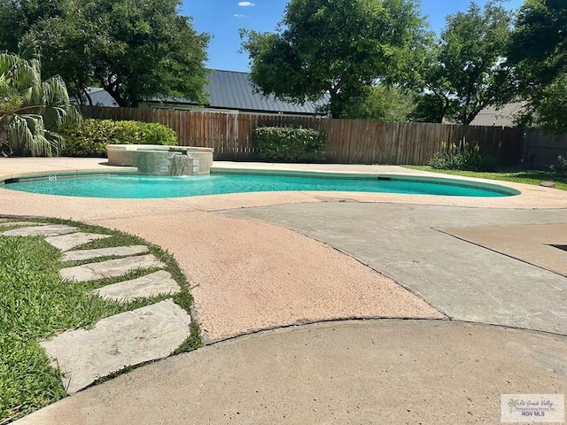 view of pool featuring a fenced backyard, a fenced in pool, and a patio