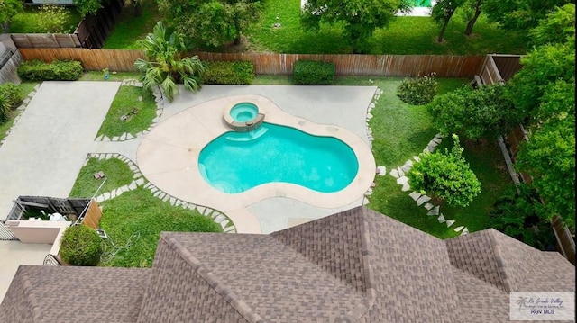 view of pool featuring a patio and a fenced backyard