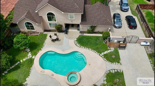 view of swimming pool with a patio area and a fenced backyard
