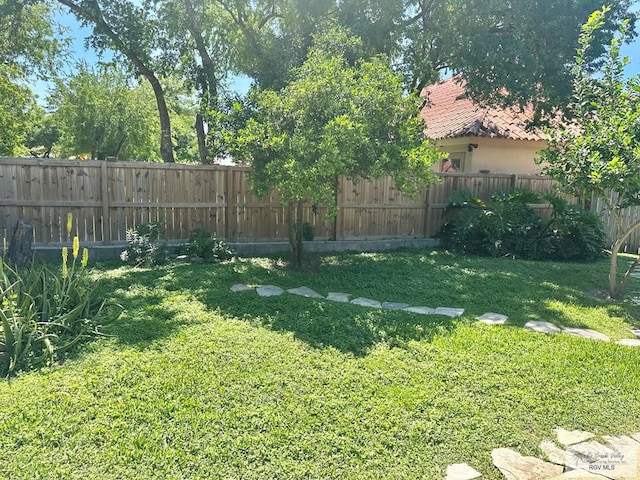 view of yard with fence