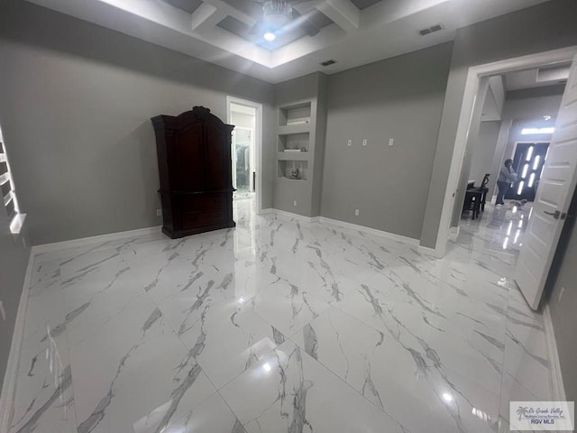 27360 Prudencia St Unit 16, Brownsville, TX 78521 - empty room with coffered ceiling, baseboards, beamed ceiling, and light marble finish flooring