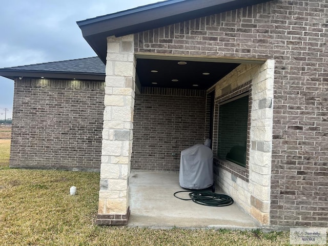 view of patio with a grill