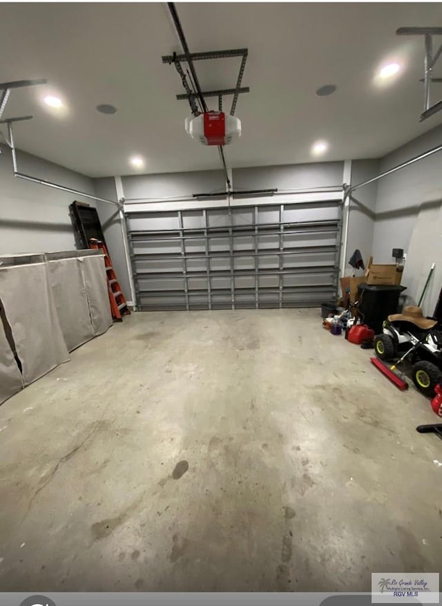 27360 Prudencia St Unit 16, Brownsville, TX 78521 - garage with a garage door opener