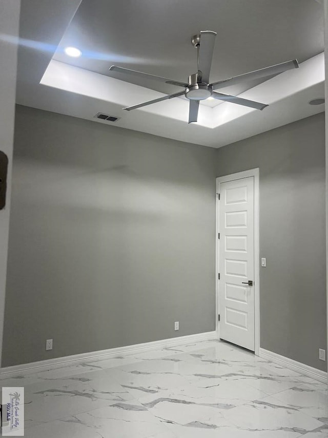 spare room featuring ceiling fan