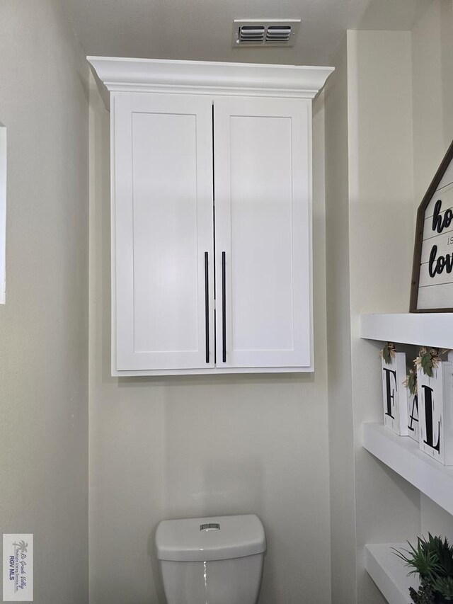 bathroom featuring hardwood / wood-style flooring, vanity, and a shower with door