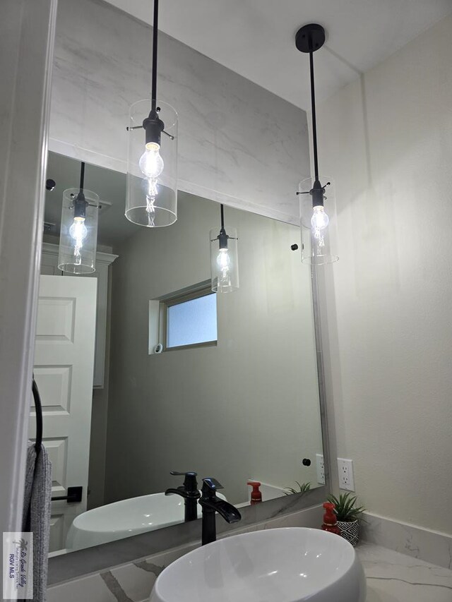 bathroom with vanity and walk in shower